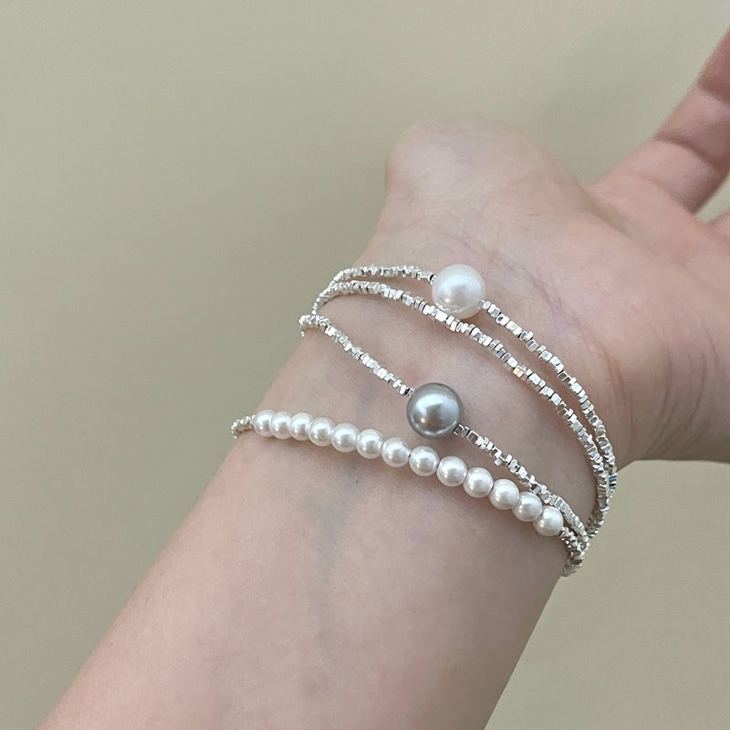 Bracciale minimalista in argento rotto con patchwork e perle