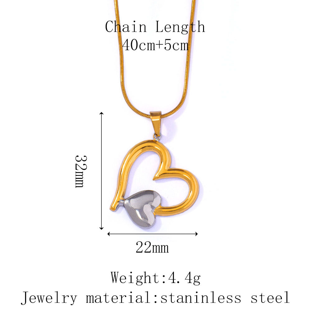 Collana con ciondolo a forma di cuore traforato in acciaio inossidabile bicolore