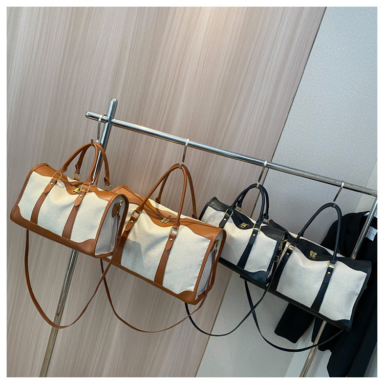 Borsa tote portatile di grande capacità da donna, ideale per i viaggi.