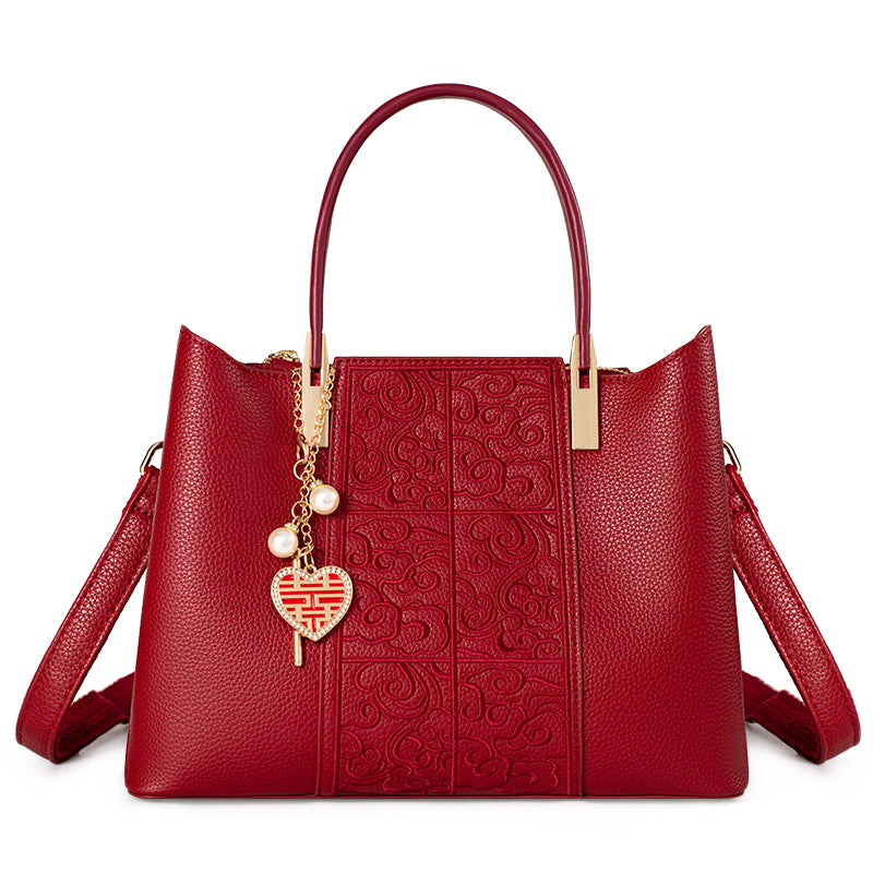 Borsa  rossa di alta qualità ricamata