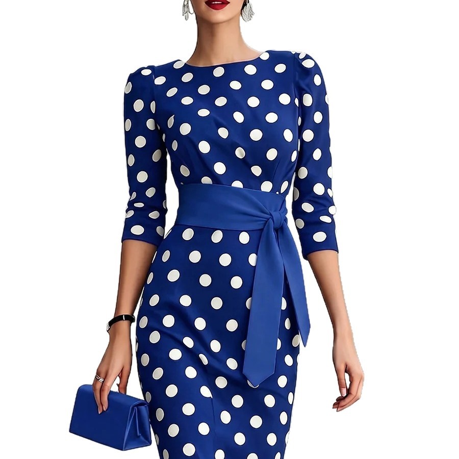 Abito elegante aderente in vita, blu navy a pois in stile retrò, con cintura.