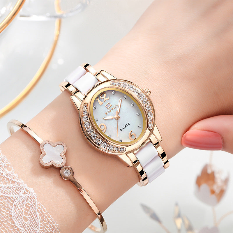New elegant women's oval watch, studded with stones, waterproof, quartz, with luminescent dial