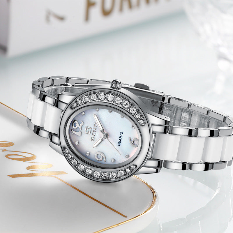 Nuovo orologio da donna elegante, ovale, tempestato di pietre