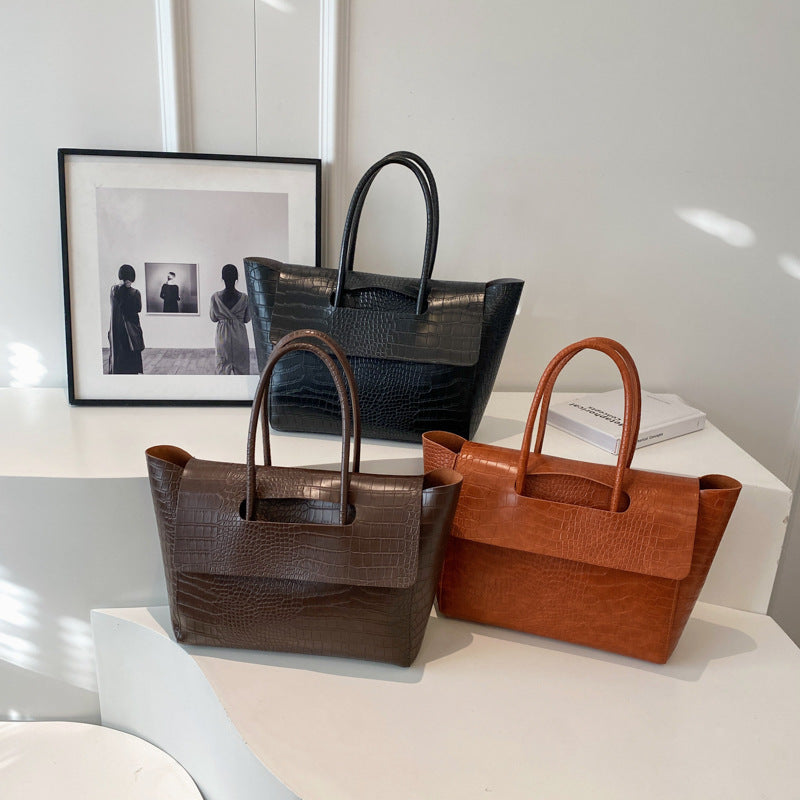 Nuova borsa a mano capiente con motivo a pietra