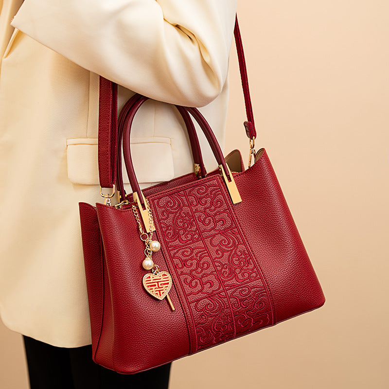 Borsa  rossa di alta qualità ricamata