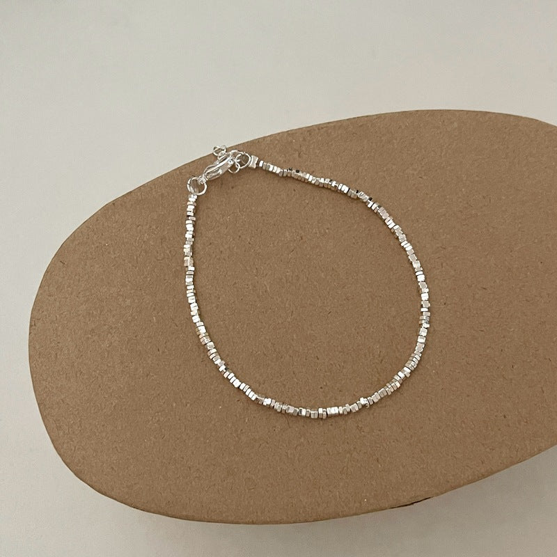 Bracciale minimalista in argento rotto con patchwork e perle
