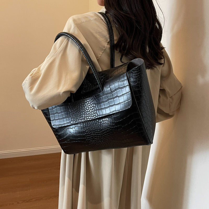 Nuova borsa a mano capiente con motivo a pietra