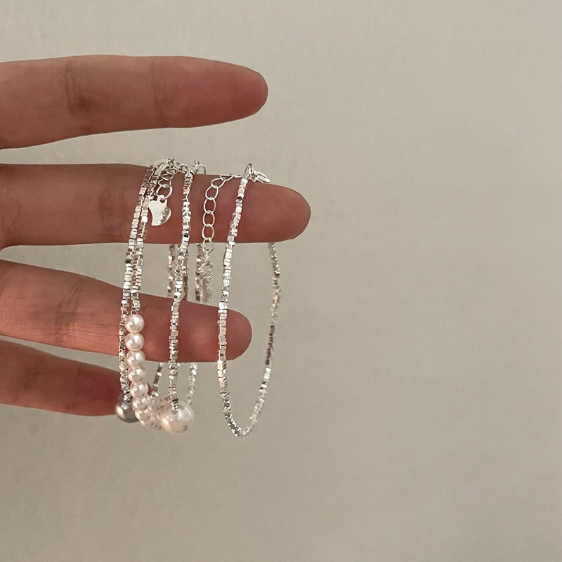 Bracciale minimalista in argento rotto con patchwork e perle