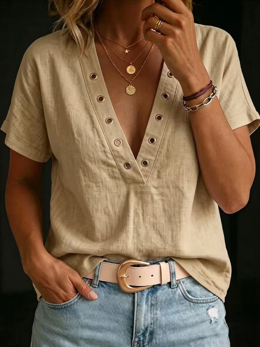Camicia da donna ampia, casual, con scollo a V, maniche corte e tinta unita.