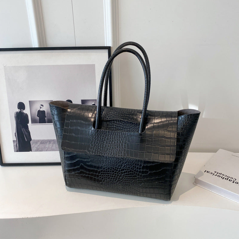 Nuova borsa a mano capiente con motivo a pietra
