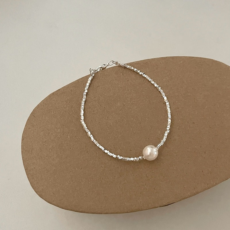 Bracciale minimalista in argento rotto con patchwork e perle