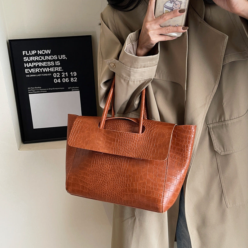 Nuova borsa a mano capiente con motivo a pietra
