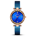 Elegante orologio da donna al quarzo con movimento importato e quadrante a specchio, cinturino in acciaio e dettagli in diamanti.