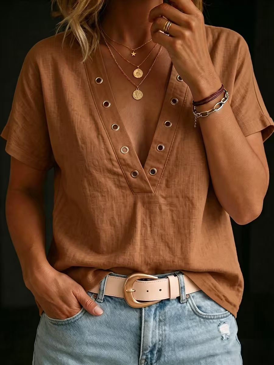 Camicia da donna ampia, casual, con scollo a V, maniche corte e tinta unita.