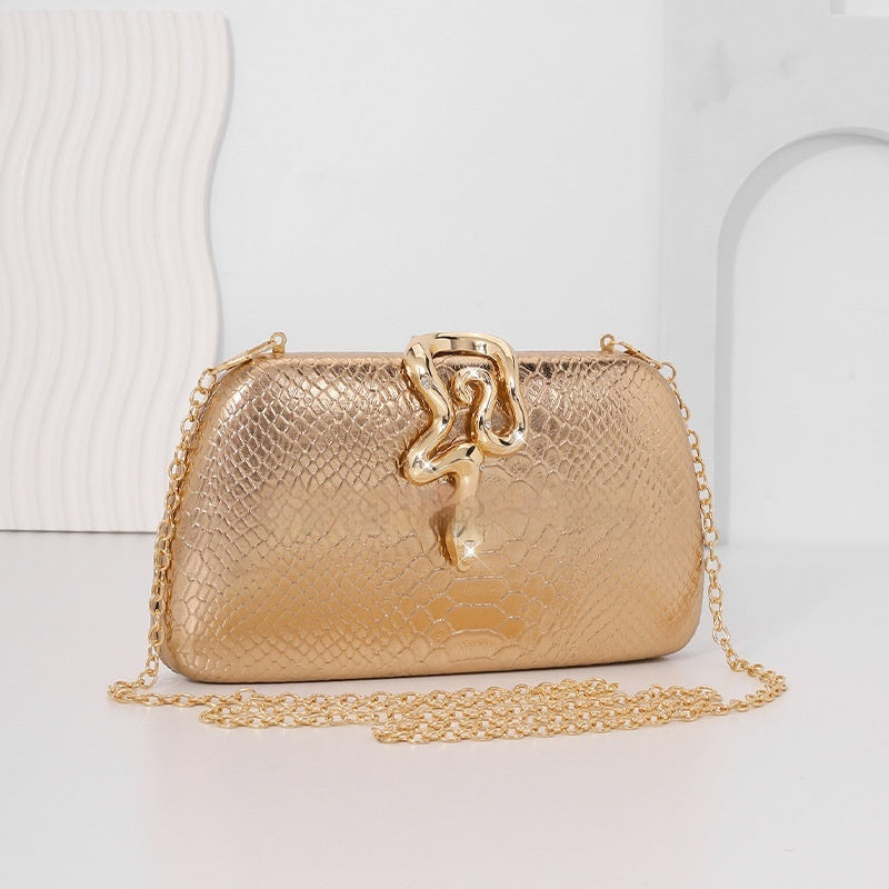 Elegante borsa da sera da donna con stampa pitonata, dal sofisticato tocco europeo-americano.