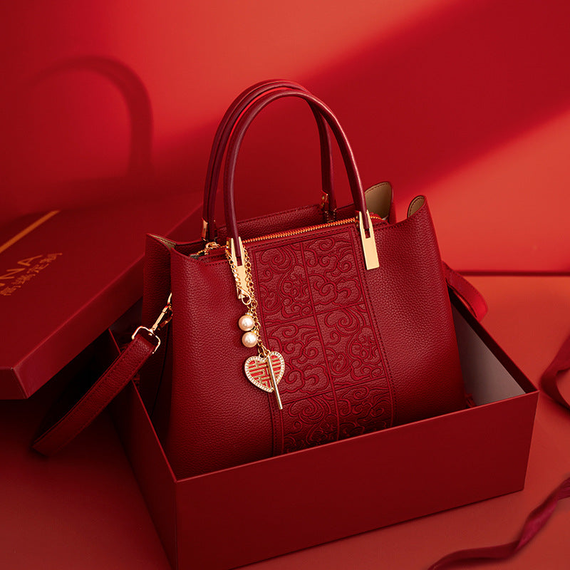 Borsa  rossa di alta qualità ricamata