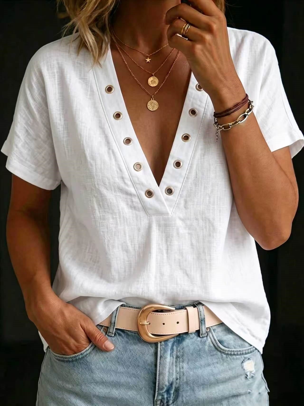 Camicia da donna ampia, casual, con scollo a V, maniche corte e tinta unita.